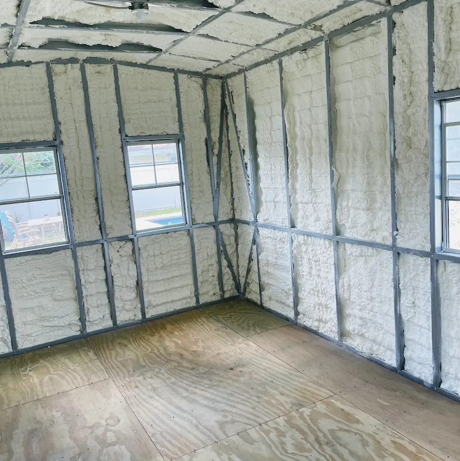 Closed-cell spray foam insulation applied to wall cavities in a residential project in Rotonda